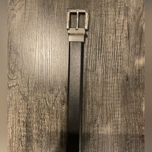 Sleek Black Leather Belt with Silver Buckle